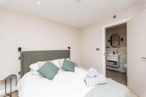 Ένα ή περισσότερα κρεβάτια σε δωμάτιο στο Modern 1Bed Flat in the Heart of Leeds City Centre