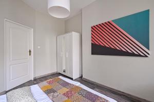 Posteľ alebo postele v izbe v ubytovaní Urban Nest Apartments Radziwiłłowska 14