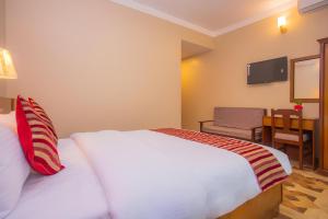 Katil atau katil-katil dalam bilik di Hotel Liberty