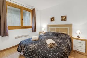 Postel nebo postele na pokoji v ubytování Andorra Active Leisure Apartment - Happy Rentals