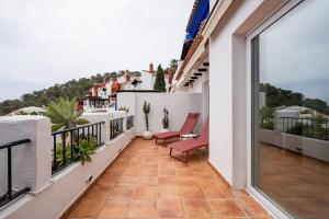 A balcony or terrace at Casa del Mar