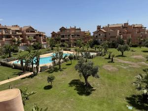 an aerial view of a resort with a swimming pool at Mar Menor Golf Resort in Murcia