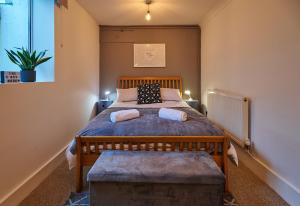 Postel nebo postele na pokoji v ubytování The Cosy Nook