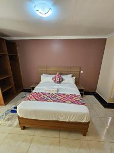 Uma cama ou camas num quarto em Big Tusks Hotel, Marsabit
