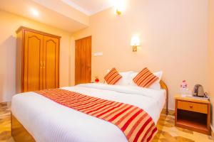 Katil atau katil-katil dalam bilik di Hotel Liberty
