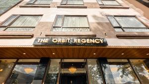 甘托克Orbit Regency的一座带有轨道登记标志的建筑