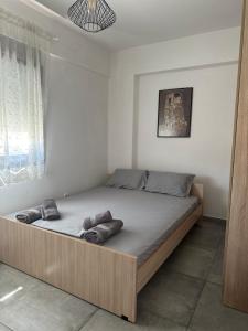 Postel nebo postele na pokoji v ubytování Artemis House