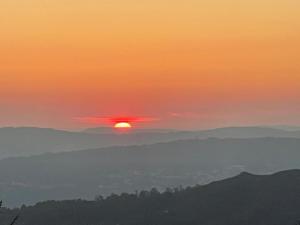 O nascer ou o pôr do sol visto a partir da casa de férias