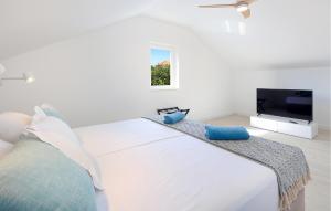 Voodi või voodid majutusasutuse Awesome Home In Pasman toas