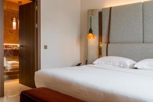 Ca'di Dio-Small Luxury Hotel客房内的一张或多张床位