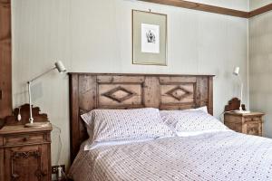 Postel nebo postele na pokoji v ubytování Beautiful 3 bedroom flat in Cortina with car park