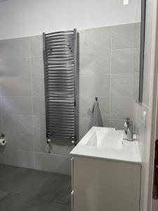 Koupelna v ubytování Artemis House + 11 fotografií