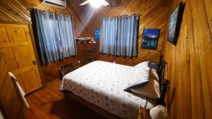Posteľ alebo postele v izbe v ubytovaní Guava Grove Resort & Villas