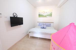Postel nebo postele na pokoji v ubytování Delipark Mall Luas 60Meter 2Kamar Lexington Lt7 + 30 fotografií