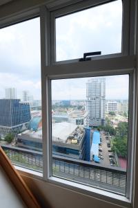 Nespecifikovaný výhled na destinaci Medan nebo výhled na město při pohledu z apartmánu