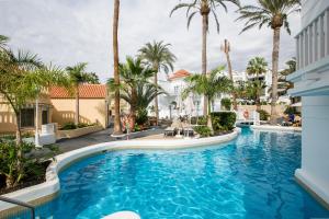 a pool at the resort at Luxury Apartment Tenerife in Adeje