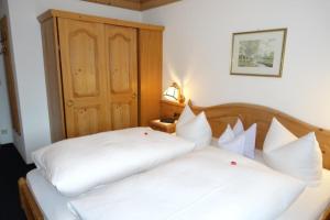 Postel nebo postele na pokoji v ubytování Haus Schmiederer
