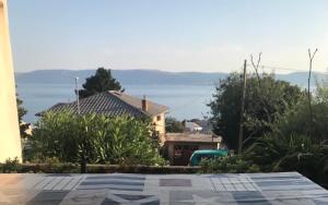 a house with a view of the water at Gente di mare in Novi Vinodolski