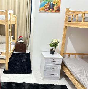Postel nebo postele na pokoji v ubytování Abu Dhabi Center - Unique Bed Space