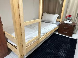 Postel nebo postele na pokoji v ubytování Abu Dhabi Center - Unique Bed Space