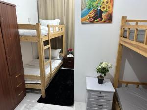 Postel nebo postele na pokoji v ubytování Abu Dhabi Center - Unique Bed Space
