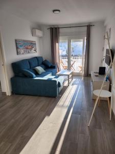 Khu vực ghế ngồi tại Apartamento reformado en Vejer