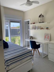 Postel nebo postele na pokoji v ubytování Verão Perfeito no Condomínio Blue, Xangri-La