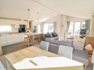 a living room with a couch and a table at 28 Finch in Scarborough