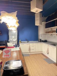 Kuchyň nebo kuchyňský kout v ubytování Baramgot Guesthouse