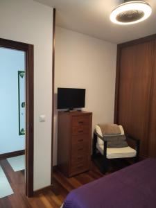 Łóżko lub łóżka w pokoju w obiekcie apartment garden