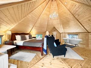 Postel nebo postele na pokoji v ubytování Aos Sí Lodges