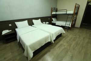 Cama o camas de una habitación en Riverside Hotel