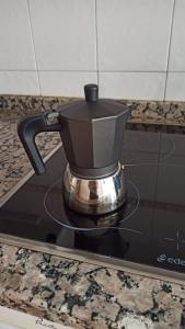 Coffee and tea making facilities at Babieca Casa con Garaje