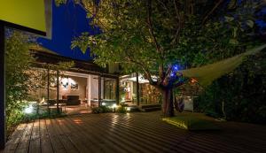 Κήπος έξω από το Au calme, piscine et spa privés