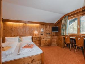 Łóżko lub łóżka w pokoju w obiekcie Apartment Mitteregg by Interhome