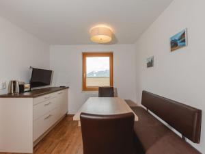 Telewizja i/lub zestaw kina domowego w obiekcie Apartment Mitteregg by Interhome