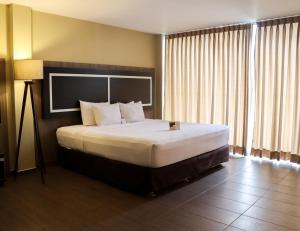 Postel nebo postele na pokoji v ubytování Rado Hotel - Santa María