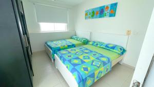 Postel nebo postele na pokoji v ubytování Hermoso Apartamento Frente al Mar 3 Habitaciones TR12