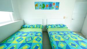 Postel nebo postele na pokoji v ubytování Hermoso Apartamento Frente al Mar 3 Habitaciones TR12