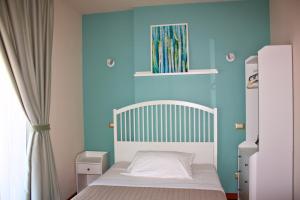 Postel nebo postele na pokoji v ubytování SIGIS HOTEL - Fiumicino