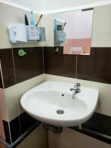 Koupelna v ubytování Taman Tinah Homestay + 28 fotografií