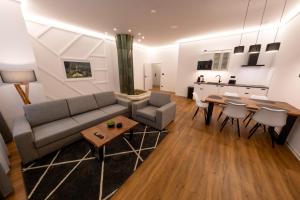 Kuchyň nebo kuchyňský kout v ubytování IT Centrum Apartments