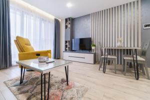TV a/nebo společenská místnost v ubytování LDV 13 Residence Free private parking