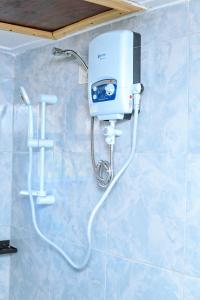 a camera is hooked up to a wall at Henotes B&B in Kamuli +45 photos