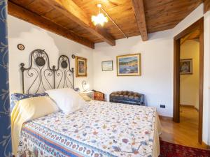 Postel nebo postele na pokoji v ubytování Apartment Casa Orai Mountain View by Interhome
