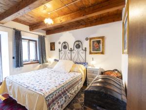 Postel nebo postele na pokoji v ubytování Apartment Casa Orai Mountain View by Interhome