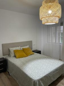 Ένα ή περισσότερα κρεβάτια σε δωμάτιο στο Apartamento Da Avoa Teresa