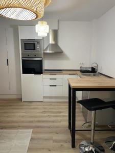 Η κουζίνα ή μικρή κουζίνα στο Apartamento Da Avoa Teresa