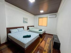 Postel nebo postele na pokoji v ubytování Casa vacional de playa Santorini