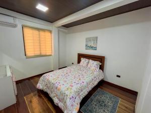 Postel nebo postele na pokoji v ubytování Casa vacional de playa Santorini